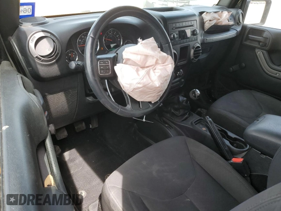 2015 Jeep Wrangler Sport with VIN 1C4AJWAG3FL723090, listed as a Copart auction lot 53325235 with 96,306 mi miles and Salvage title. Bid and sale history available at DreamBid. Image 8.