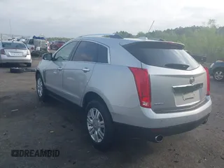 2015 Cadillac SRX Luxury Collection with VIN 3GYFNBE3XFS612048, listed as a IAAI auction lot 41923525 with 154,621 mi miles. Bid and sale history available at carsss.com. Image 3.