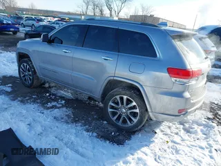 2018 Jeep Grand Cherokee High Altitude with VIN 1C4RJFCG5JC355584, listed as a IAAI auction lot 41403722 with 96,273 mi miles. Bid and sale history available at carsss.com. Image 3.
