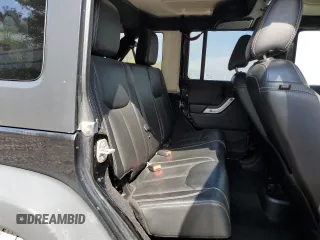 2015 Jeep Wrangler Unlimited Rubicon Hard Rock z VIN 1C4HJWFG5FL706170, wystawiony jako Copart lot #55442965 z przebiegiem Nie podano mil oraz Czysty tytuł • Clean title. Historia ofert i sprzedaży dostępna na DreamBid. Obrazek 11.