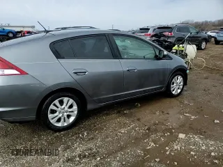 2013 Honda Insight EX z VIN JHMZE2H73DS003120, wystawiony jako Copart lot #49315265 z przebiegiem 171 702 mil mil oraz Szkoda całkowita • Salvage title. Historia ofert i sprzedaży dostępna na DreamBid. Obrazek 14.