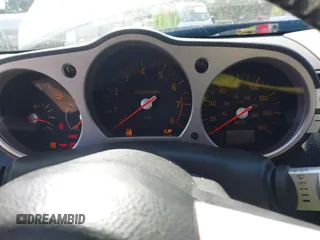 2003 Nissan 350Z Touring z VIN JN1AZ34E03T004458, wystawiony jako IAAI lot #42361684 z przebiegiem 147 847 mil mil oraz . Historia ofert i sprzedaży dostępna na DreamBid. Obrazek 7.