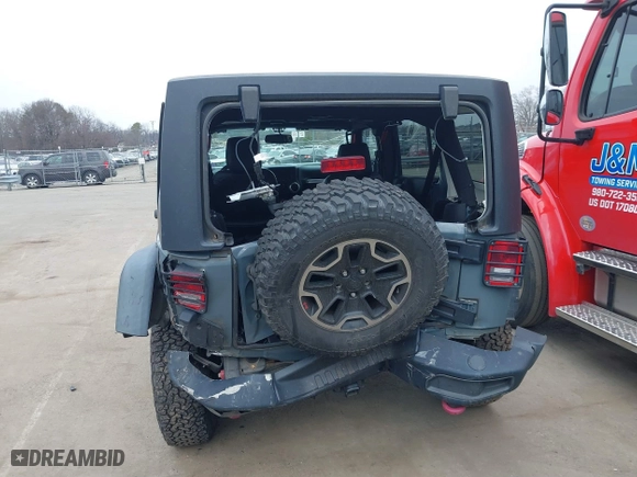 2015 Jeep Wrangler Unlimited Rubicon Hard Rock with VIN 1C4HJWFG1FL679873, listed as a IAAI auction lot 41508722 with 97,165 mi miles. Bid and sale history available at carsss.com. Image 16.