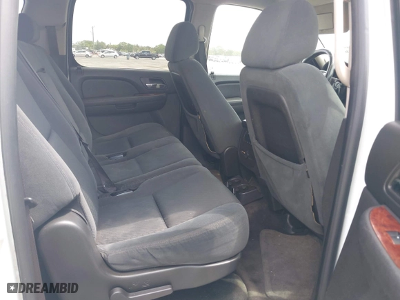 2009 Chevrolet Suburban LT w/2LT with VIN 1GNFC26JX9J108623, listed as a IAAI auction lot 42115456 with 144,370 mi miles. Bid and sale history available at carsss.com. Image 8.