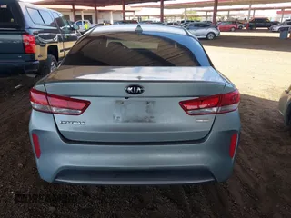 2017 Kia Optima with VIN KNAGT4LE7H5011951, listed as a IAAI auction lot 42693488 with 91,497 mi miles and . Bid and sale history available at DreamBid. Image 16.