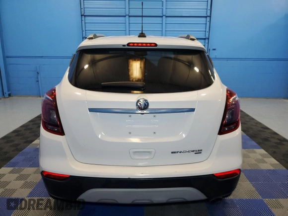 2019 Buick Encore Essence with VIN KL4CJGSM0KB895977, listed as a Copart auction lot 68799364 with 57,052 mi miles and Clean Title. Bid and sale history available at DreamBid. Image 6.