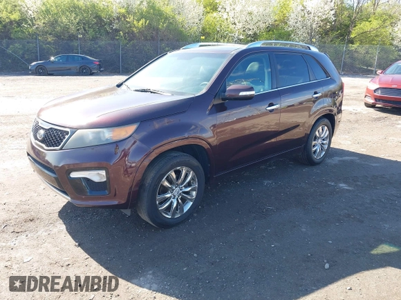 2011 Kia Sorento SX with VIN 5XYKW4A27BG163580, listed as a IAAI auction lot 41987362 with 172,097 mi miles. Bid and sale history available at carsss.com. Image 2.