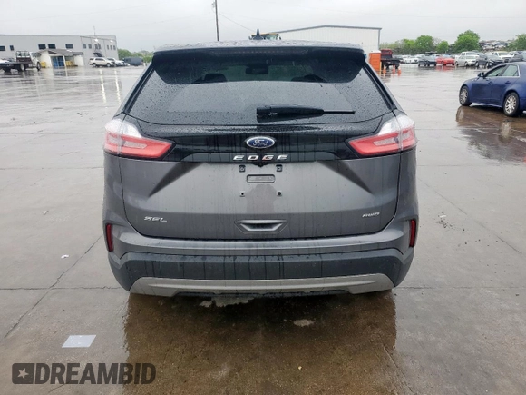 2024 Ford Edge SEL z VIN 2FMPK4J97RBA98092, wystawiony jako Copart lot #52000715 z przebiegiem 23 845 mil mil oraz Szkoda całkowita • Salvage title. Historia ofert i sprzedaży dostępna na DreamBid. Obrazek 6.
