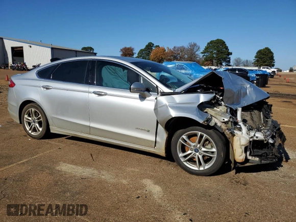 2016 Ford Fusion Titanium Hybrid with VIN 3FA6P0RU2GR114027, listed as a Copart auction lot 85223884 with Not provided miles and Salvage title. Bid and sale history available at DreamBid. Image 4.