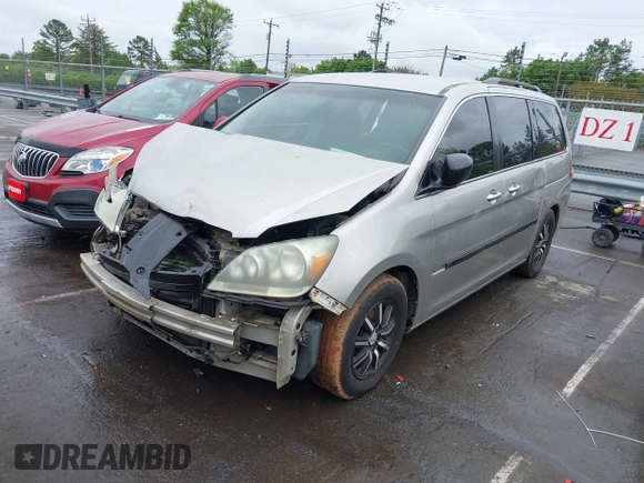 2005 Honda Odyssey EX with VIN 5FNRL38445B412759, listed as a IAAI auction lot 41975304 with 133,221 mi miles. Bid and sale history available at carsss.com. Image 2.