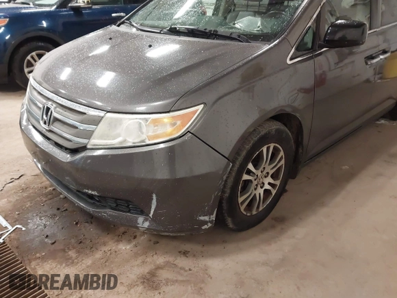2011 Honda Odyssey EX-L with VIN 5FNRL5H67BB049446, listed as a IAAI auction lot 42116436 with 197,667 mi miles and . Bid and sale history available at carsss.com. Image 6.