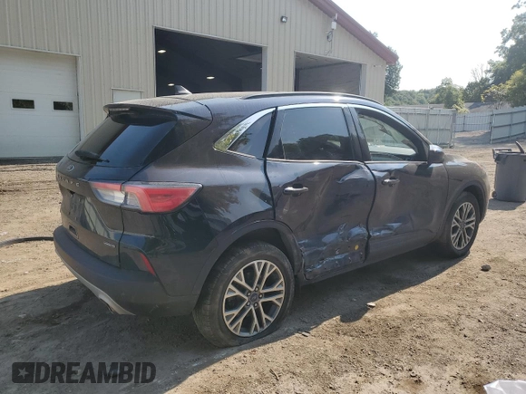 2021 Ford Escape SEL Hybrid z VIN 1FMCU9CZ7MUA94260, wystawiony jako Copart lot #71013514 z przebiegiem Nie podano mil oraz Szkoda całkowita • Salvage title. Historia ofert i sprzedaży dostępna na DreamBid. Obrazek 3.