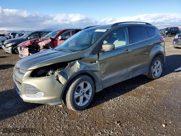 2014 Ford Escape SE with VIN 1FMCU9GX1EUA39412, listed as a Copart auction lot 84719254 with 125,865 mi miles and Salvage Title. Bid and sale history available at carsss.com. Image 1.