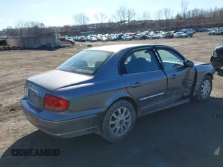 2005 Hyundai Sonata GLS with VIN KMHWF35H35A119750, listed as a IAAI auction lot 41687575 with 146,419 mi miles. Bid and sale history available at carsss.com. Image 4.