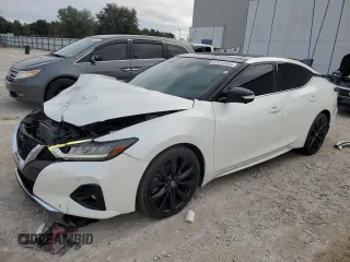 2019 Nissan Maxima Platinum z VIN 1N4AA6AV0KC375456, wystawiony jako Copart lot #87414204 z przebiegiem 71 705 mil mil oraz Szkody całkowita. Historia ofert i sprzedaży dostępna na DreamBid. Obrazek 1.