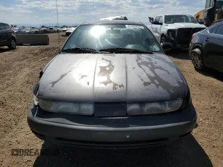 1998 Saturn SL с VIN 1G8ZH528XWZ140961, выставлен на аукционе Copart как лот 61259575 с пробегом 237 291 миль миль и Списание • Salvage title. История ставок и продаж доступна на DreamBid. Изображение 5.
