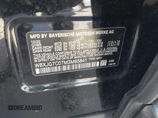 2021 BMW X1 sDrive28i with VIN WBXJG7C07M3M65841, listed as a IAAI auction lot 41877032 with 79,817 mi miles and . Bid and sale history available at DreamBid. Image 9.