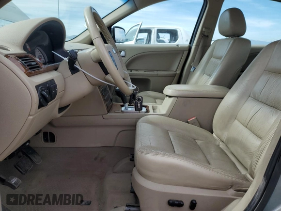 2007 Ford Five Hundred Limited with VIN 1FAFP281X7G123147, listed as a Copart auction lot 71552474 with 184,409 mi miles and Clean title. Bid and sale history available at DreamBid. Image 7.