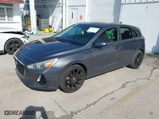 2019 Hyundai Elantra GT with VIN KMHH35LE7KU090138, listed as a IAAI auction lot 41882979 with 122,596 mi miles. Bid and sale history available at carsss.com. Image 2.