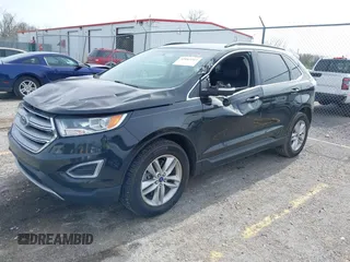 2015 Ford Edge SEL with VIN 2FMTK4J88FBB05259, listed as a IAAI auction lot 42043247 with 128,987 mi miles. Bid and sale history available at carsss.com. Image 2.