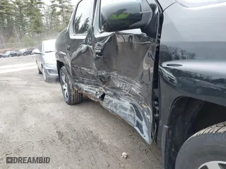 2014 Honda Ridgeline SE with VIN 5FPYK1F66EB005881, listed as a IAAI auction lot 41977349 with 184,567 mi miles. Bid and sale history available at carsss.com. Image 20.