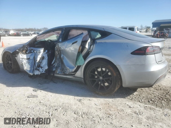 2024 Tesla Model S с VIN 5YJSA1E56RF541102, выставлен на аукционе Copart как лот 42584275 с пробегом Не указан миль и Списание • Salvage title. История ставок и продаж доступна на DreamBid. Изображение 2.