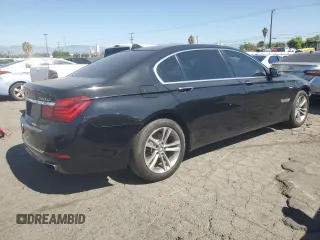 2015 BMW 7 Series 740Li with VIN WBAYE4C59FD947328, listed as a Copart auction lot 68987863 with 117,312 mi miles and . Bid and sale history available at DreamBid. Image 3.