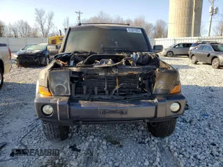 2010 Jeep Commander Sport с VIN 1J4RG4GK0AC124393, выставлен на аукционе Copart как лот 51321935 с пробегом Не указан миль и На запчасти • Non repairable. История ставок и продаж доступна на DreamBid. Изображение 5.