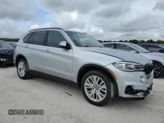 2015 BMW X5 xDrive50i with VIN 5UXKR6C51F0J74160, listed as a Copart auction lot 79337044 with 143,436 mi miles and Salvage title. Bid and sale history available at DreamBid. Image 4.