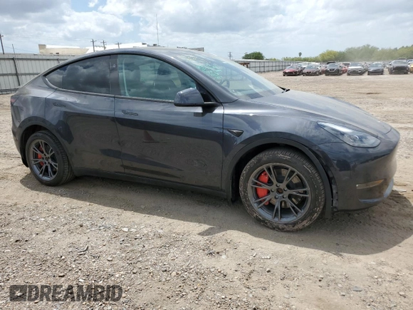 2024 Tesla Model Y Long Range with VIN 7SAYGDEE4RA316722, listed as a Copart auction lot 53207395 with 17,006 mi miles and Salvage title. Bid and sale history available at DreamBid. Image 4.