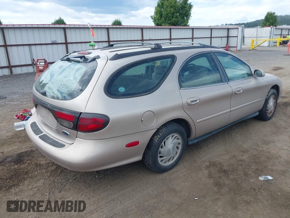 1998 Ford Taurus with VIN 1FAFP57U8WG275844, listed as a IAAI auction lot 42426107 with 318,654 mi miles and . Bid and sale history available at DreamBid. Image 4.