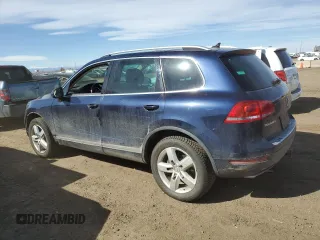 2012 Volkswagen Touareg Sport z VIN WVGFK9BP9CD000509, wystawiony jako Copart lot #48507095 z przebiegiem 164 283 mil mil oraz Szkoda całkowita • Salvage title. Historia ofert i sprzedaży dostępna na DreamBid. Obrazek 2.