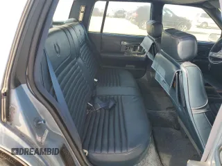 1988 Cadillac Seville z VIN 1G6KS5152JU809989, wystawiony jako Copart lot #51385205 z przebiegiem 40 217 mil mil oraz Czysty tytuł • Clean title. Historia ofert i sprzedaży dostępna na DreamBid. Obrazek 10.