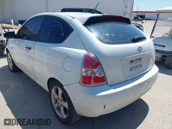 2007 Hyundai Accent SE with VIN KMHCN36C47U009459, listed as a IAAI auction lot 41979395 with 202,844 mi miles. Bid and sale history available at carsss.com. Image 3.