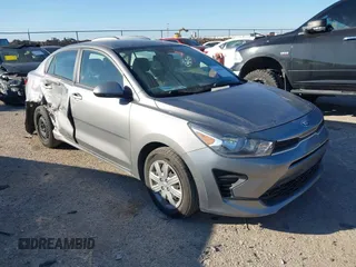 2021 Kia Rio LX with VIN 3KPA24AD8ME377938, listed as a IAAI auction lot 41465632 with 62,964 mi miles. Bid and sale history available at carsss.com. Image 1.