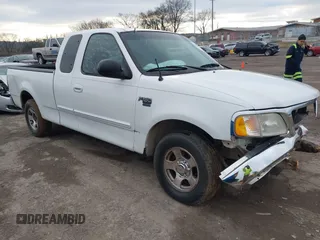2003 Ford F-150 XL with VIN 1FTRX17W43NA31343, listed as a IAAI auction lot 41576625 with 1 mi miles. Bid and sale history available at carsss.com. Image 1.