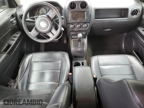 2016 Jeep Patriot High Altitude with VIN 1C4NJRFBXGD595443, listed as a Copart auction lot 59985755 with 171,776 mi miles and Salvage title. Bid and sale history available at DreamBid. Image 8.