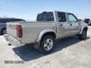 2000 Nissan Frontier XE with VIN 1N6ED27T7YC346589, listed as a Copart auction lot 53680015 with Not provided miles and Salvage title. Bid and sale history available at DreamBid. Image 3.