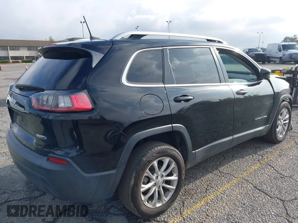 2019 Jeep Cherokee Latitude with VIN 1C4PJLCB8KD215423, listed as a IAAI auction lot 41911882 with 76,965 mi miles. Bid and sale history available at carsss.com. Image 4.