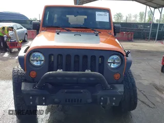 2010 Jeep Wrangler Unlimited Sport with VIN 1J4HA3H1XAL189667, listed as a IAAI auction lot 42062351 with 144,838 mi miles. Bid and sale history available at carsss.com. Image 12.