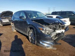 2021 Mazda CX-5 Grand Touring with VIN JM3KFBDM6M1499524, listed as a Copart auction lot 46604635 with 47,799 mi miles and Salvage Title. Bid and sale history available at carsss.com. Image 4.