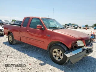 2002 Ford F-150 XL with VIN 1FTRX17202NA40522, listed as a Copart auction lot 58208915 with 100,297 mi miles and Salvage title. Bid and sale history available at DreamBid. Image 4.