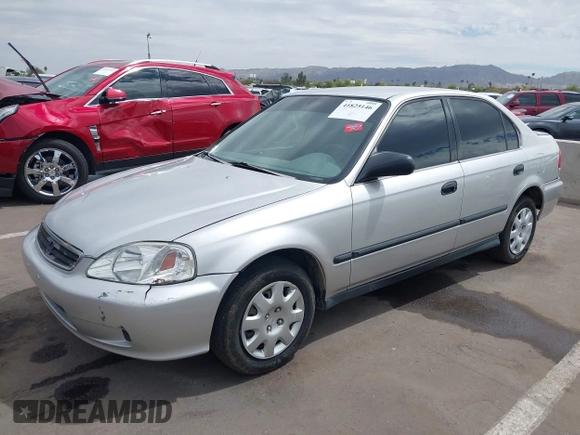 1999 Honda Civic LX with VIN JHMEJ6671XS003027, listed as a IAAI auction lot 41825146 with 197,764 mi miles and . Bid and sale history available at DreamBid. Image 17.