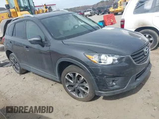 2016 Mazda CX-5 Grand Touring with VIN JM3KE4DY9G0845707, listed as a IAAI auction lot 41709685 with 96,351 mi miles. Bid and sale history available at carsss.com. Image 1.