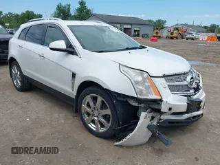 2012 Cadillac SRX Performance Collection with VIN 3GYFNEE34CS579352, listed as a IAAI auction lot 42627607 with 168,752 mi miles and . Bid and sale history available at DreamBid. Image 1.