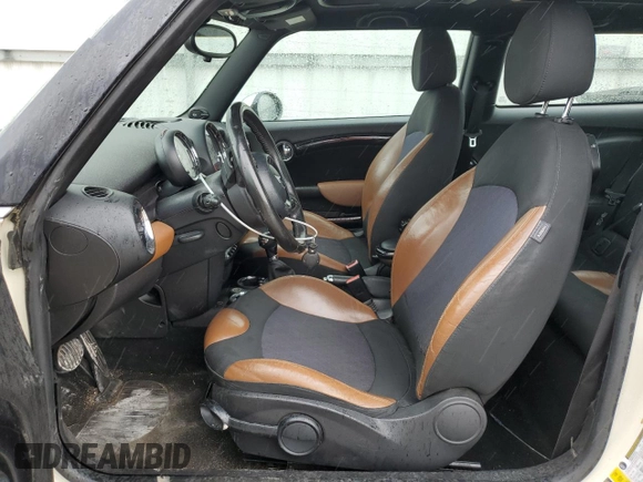 2011 MINI Hardtop S with VIN WMWSV3C56BTY15420, listed as a Copart auction lot 58050875 with 162,145 mi miles and Salvage title. Bid and sale history available at DreamBid. Image 7.