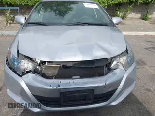 2010 Honda Insight EX with VIN JHMZE2H75AS003695, listed as a IAAI auction lot 42119429 with 90,901 mi miles and . Bid and sale history available at DreamBid. Image 6.