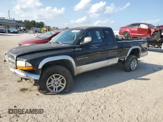 2001 Dodge Dakota SLT with VIN 1B7GG22X41S309217, listed as a Copart auction lot 44257285 with 153,872 mi miles and Salvage Title. Bid and sale history available at carsss.com. Image 1.