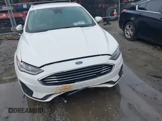 2020 Ford Fusion SE z VIN 3FA6P0HD8LR160330, wystawiony jako IAAI lot #42348552 z przebiegiem 95 610 mil mil oraz . Historia ofert i sprzedaży dostępna na DreamBid. Obrazek 12.