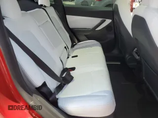 2022 Tesla Model Y Performance z VIN 7SAYGDEF9NF510183, wystawiony jako Copart lot #61263405 z przebiegiem 19 411 mil mil oraz Szkoda całkowita • Salvage title. Historia ofert i sprzedaży dostępna na DreamBid. Obrazek 10.